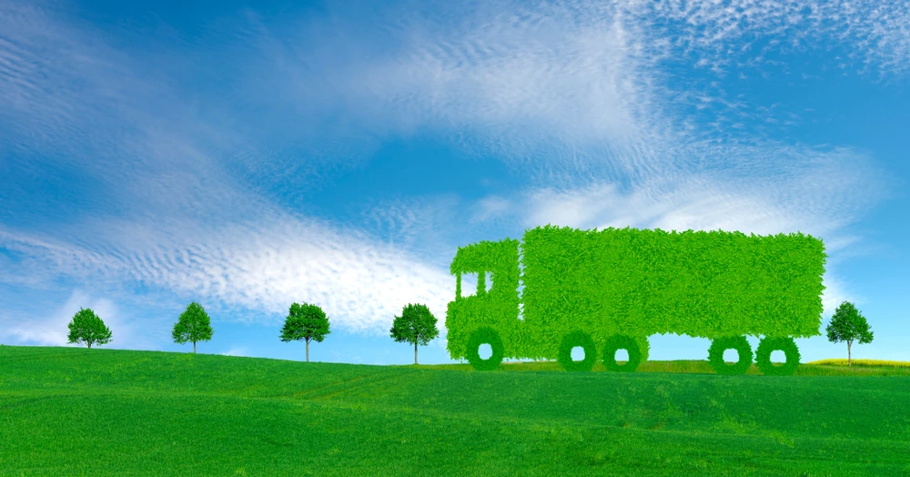 Green truck silhouette of leaves representing eco-friendly HVUT form 2290